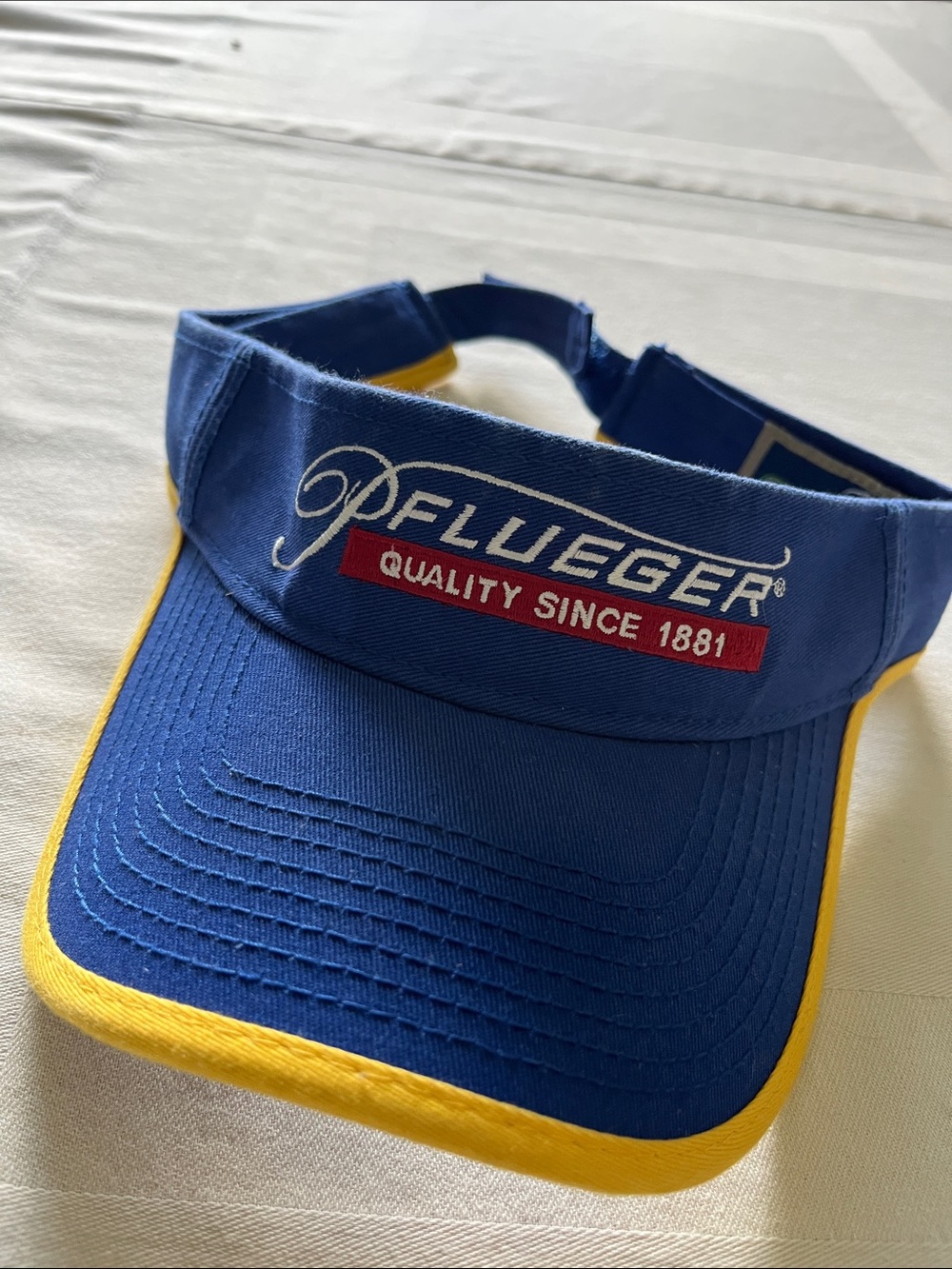 Pflueger Royal Blue and Yellow Fishing Visor “Quality Since 1881” Logo Patch
